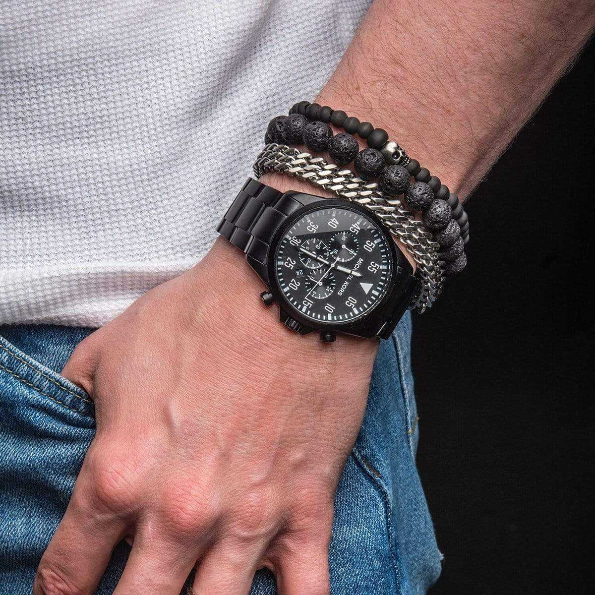 INOX JEWELRY Bracelets Silver Tone Stainless Steel and Black Carbon Fiber Bead Skull Bracelet BRL0735